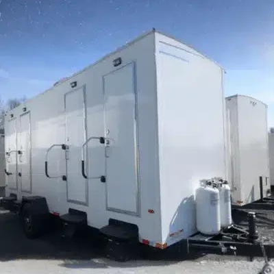 4 stall shower trailer parked in yard across NY and NJ